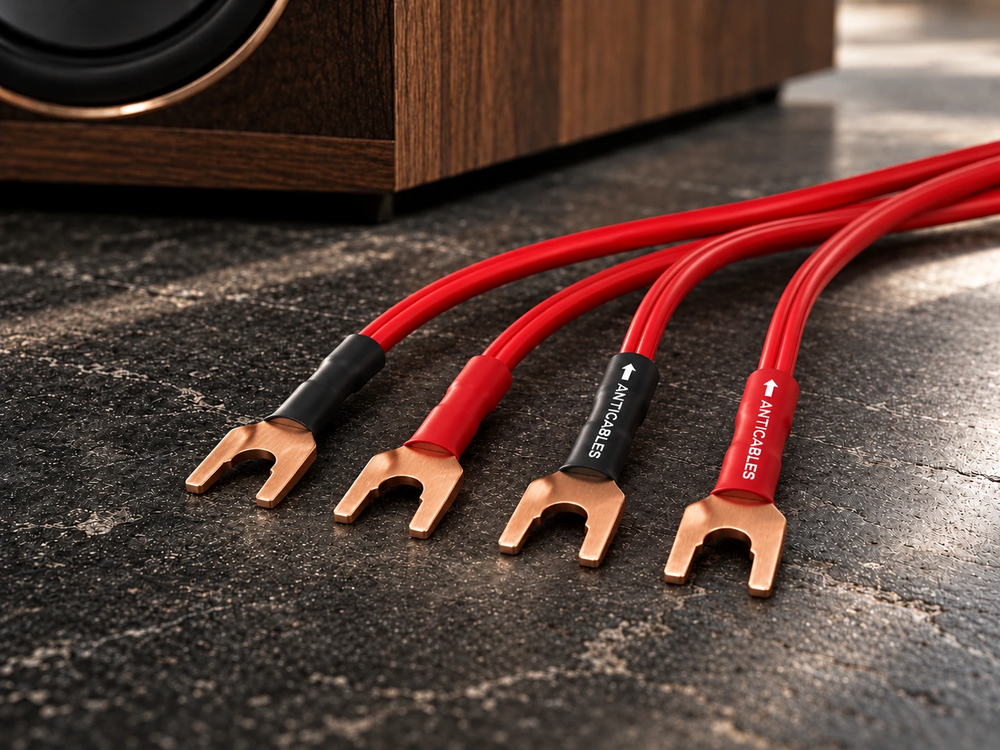 ANTICABLES red speaker wires with copper spades — AI-assisted campaign concept in a stone and walnut listening room